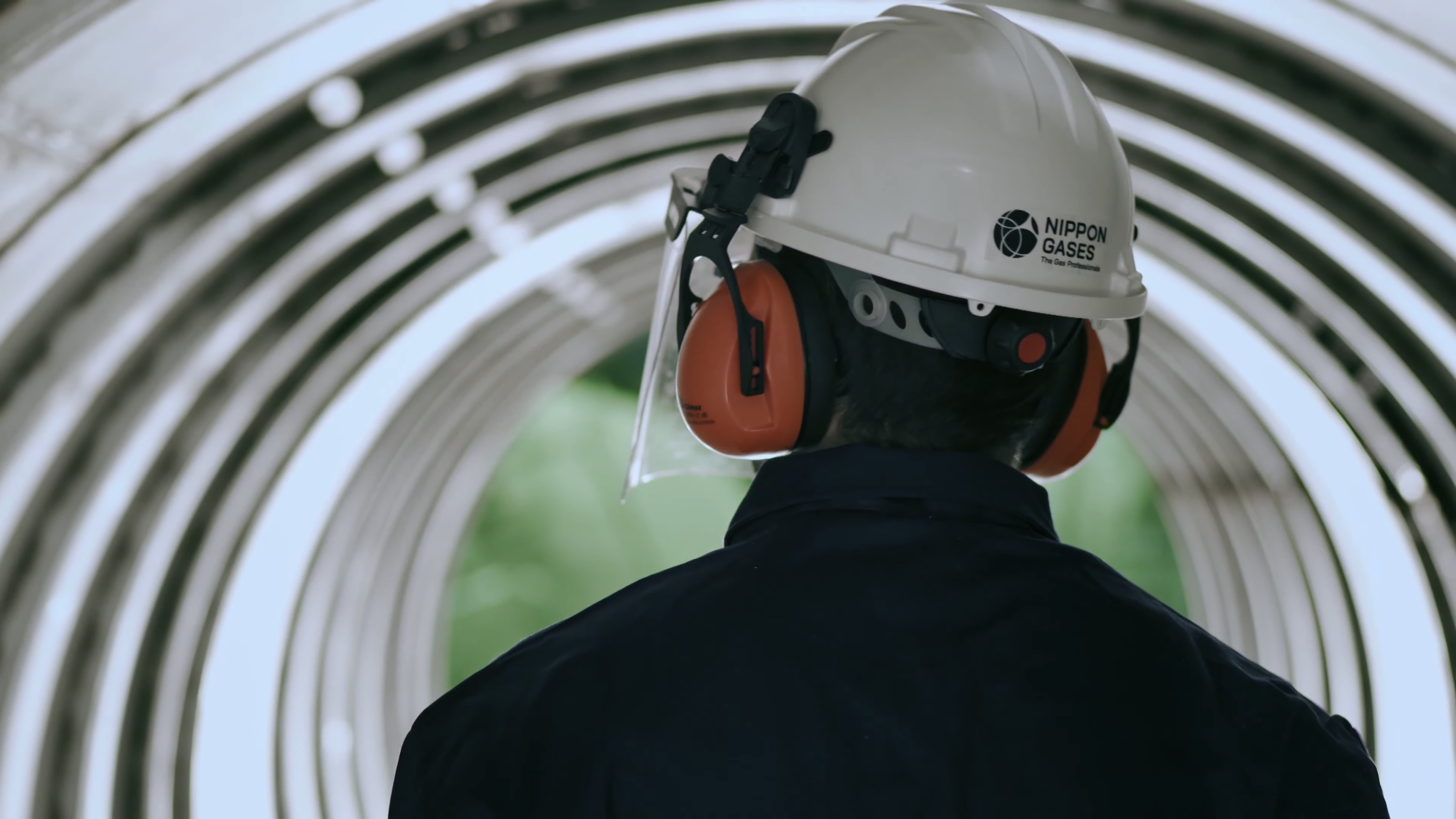 Operator with helmet banner